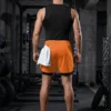 Ensemble de vêtements de sport pour hommes, t-shirt de compression sans manches, débardeur, short de sport 2 en 1 avec poche pour téléphone et boucle pour serviette