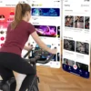 Vélo d'exercice amélioré, 32 niveaux de résistance magnétique fluide, vélo d'intérieur avec support pour tablette et écran LCD, charge maximale 265 LBS