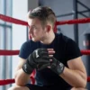Gants de boxe pour MMA, Muay Thai, combat libre, Taekwondo, entraînement au sac de frappe, gants de boxe demi-doigts